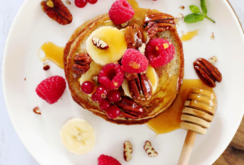 Banana Buckwheat Pancakes with Raspberries & Manuka Honey