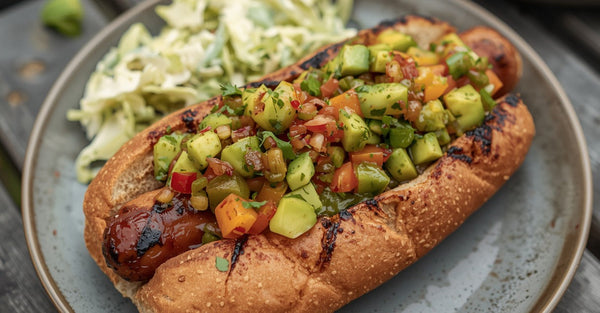 Grilled Frankfurters with Charred Pepper Avocado Salsa & Chipotle Drizzle