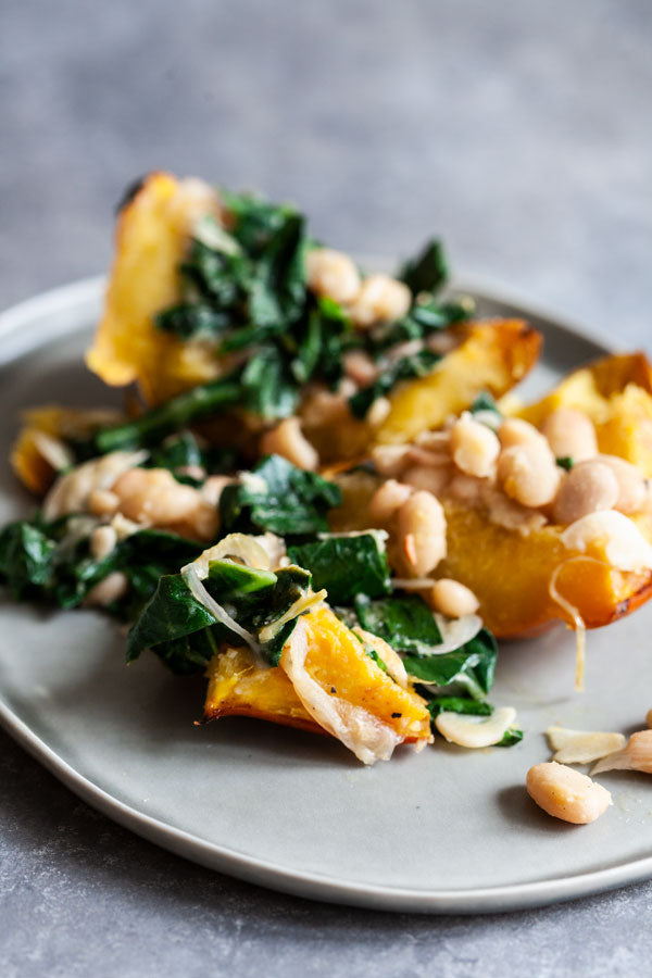 Stuffed Acorn Squash with Garlicky Beans & Greens