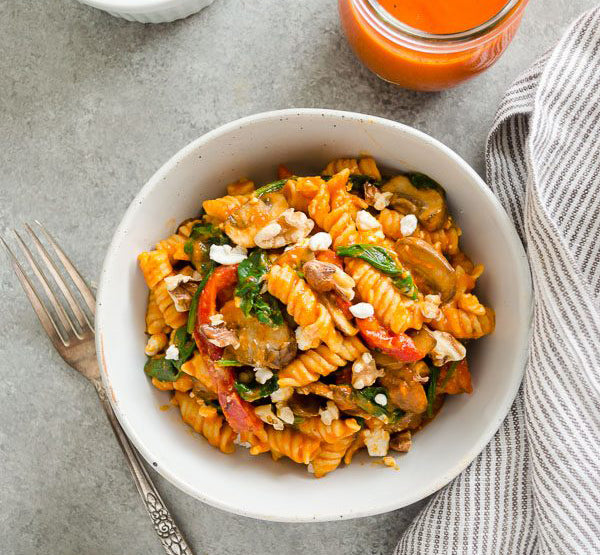 Roasted Red Pepper Chickpea Lentil Pasta with Goat Cheese, Mushrooms and Spinach
